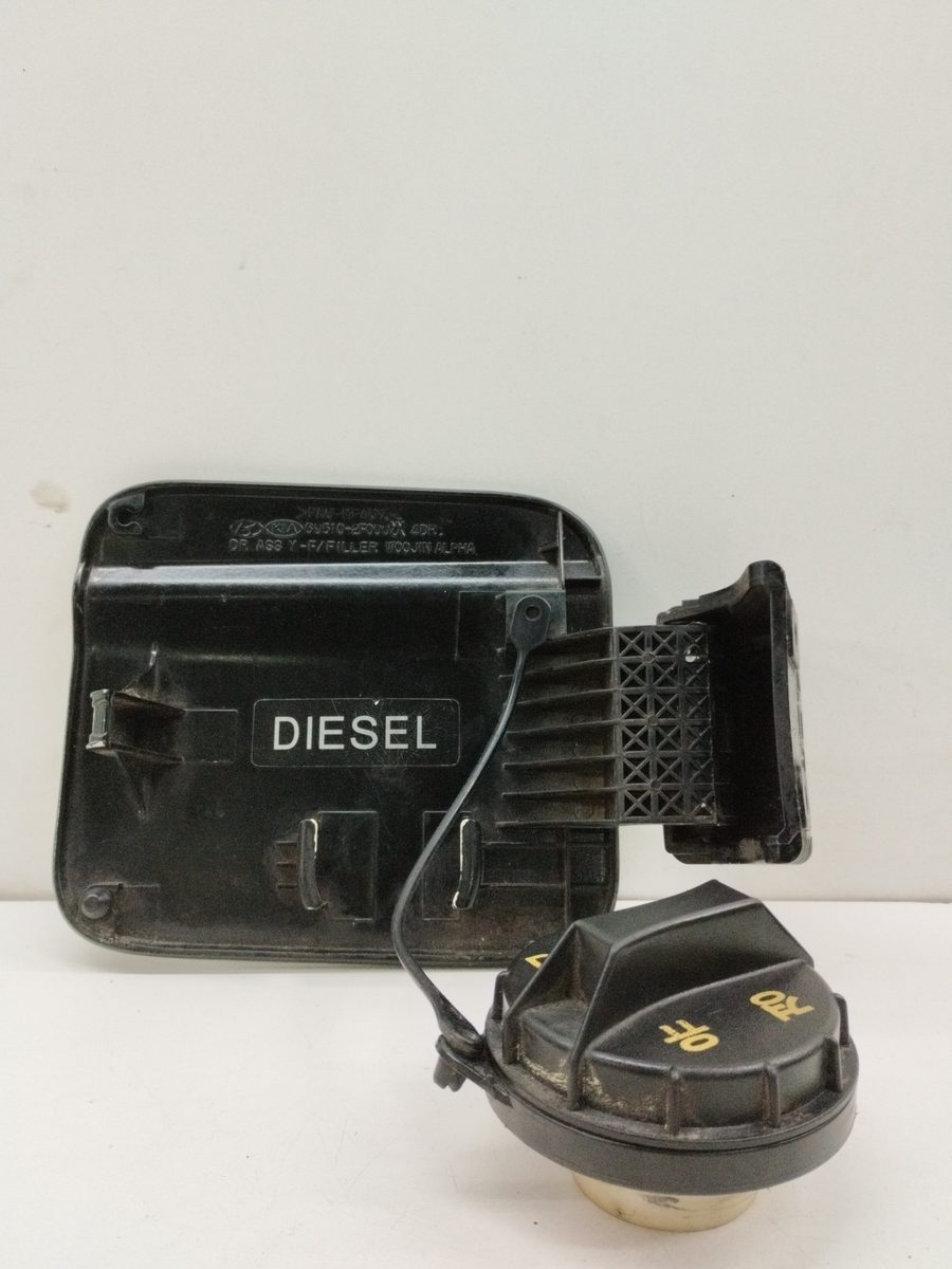 Tapa Exterior Combustible Kia Cerato 2004-2007